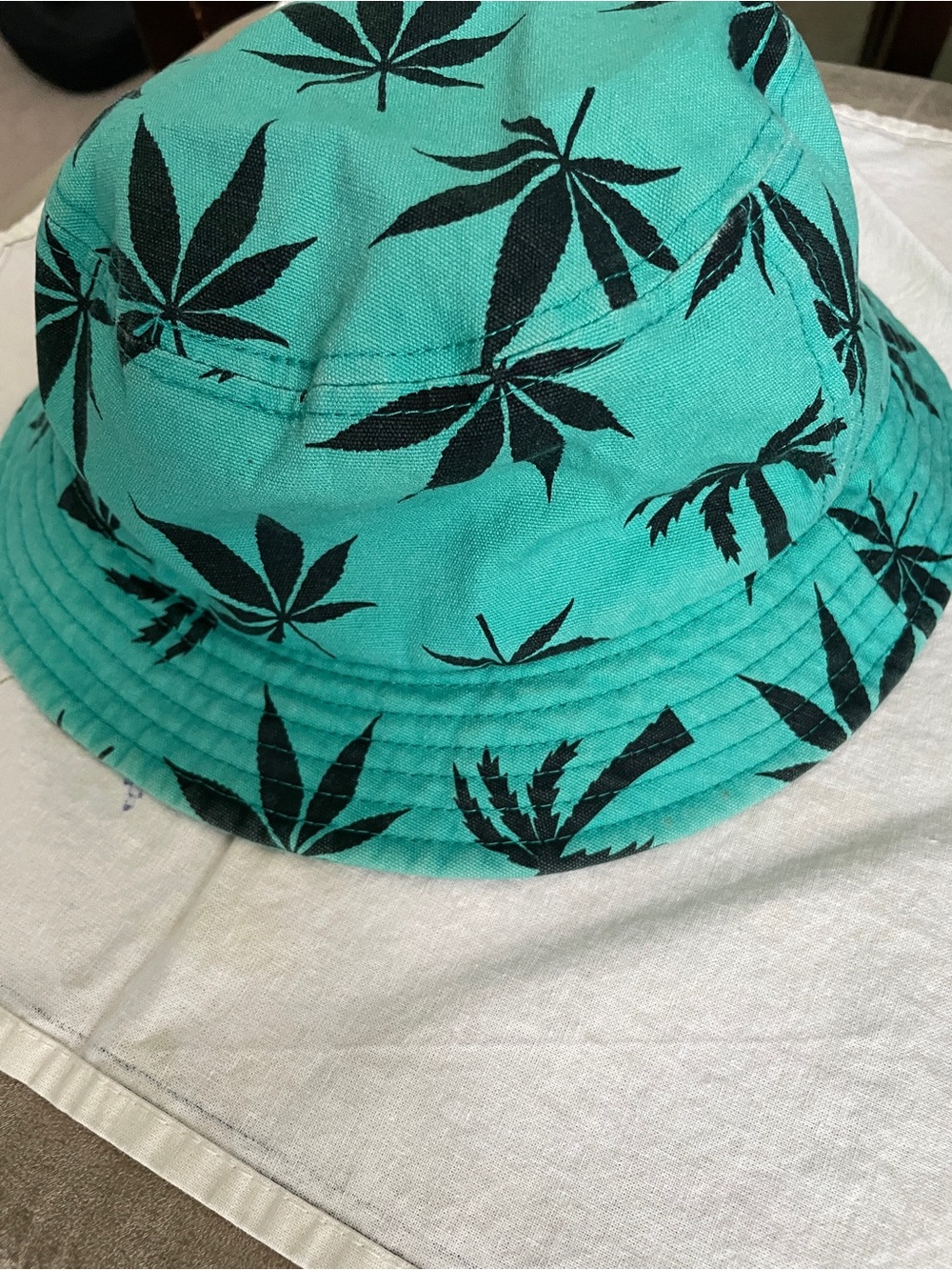 100% Cotton BLVD Teal Bucket Hat with Black Leaf Print